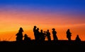 Silhouette tourists and photographers with beautiful sunrise