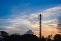 Silhouette of Tower antenna transmission. Repeater of communication and telecommunication with beautiful cloudy sky at sunset on Royalty Free Stock Photo