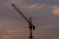 silhouette of a tower crane at dusk Royalty Free Stock Photo