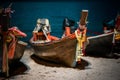 Silhouette of traditional fishing boat at the shore after sunset. Romantic outdoor photography on a night beach with Royalty Free Stock Photo