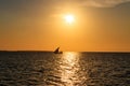 Silhouette of traditional wooden dhow boat in the Indian ocean at sunset in Zanzibar, Tanzania Royalty Free Stock Photo