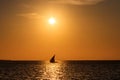 Silhouette of traditional wooden dhow boat in the Indian ocean at sunset in Zanzibar, Tanzania Royalty Free Stock Photo