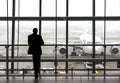 Silhouette of a traveler waiting for a plane.