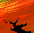 silhouette tree on colourful background with a flowing style cloudy sky Royalty Free Stock Photo