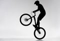 silhouette of trial biker performing bunny hop Royalty Free Stock Photo