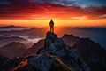 Silhouette of a triumphant individual standing a mountain peak , Leadership Concept.