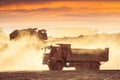 Silhouette of the truck in the building site