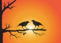 Silhouette of two birds on branch on sunrise background Royalty Free Stock Photo
