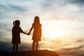 Silhouette of two girl having fun Royalty Free Stock Photo