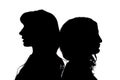 Silhouette. Two girls stand with their backs to each other on a white background.