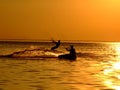 Silhouette of a two kitesurf