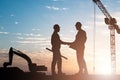 Silhouette Of Two Male Architect Shaking Hands Royalty Free Stock Photo