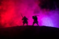 Silhouette of two samurais in duel. Picture with two samurais and sunset sky Royalty Free Stock Photo