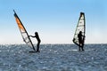 Silhouette of a two windsurfers Royalty Free Stock Photo