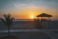 Silhouette of Typical Lifeguard tower station at sunset, Baywatch tower on the beach. Royalty Free Stock Photo