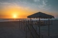 Silhouette of Typical Lifeguard tower station at sunset, Baywatch tower on the beach. Royalty Free Stock Photo