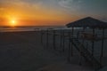 Silhouette of Typical Lifeguard tower station at sunset, Baywatch tower on the beach. Royalty Free Stock Photo