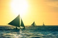 Silhouette of typical sailing boats at sunset in Boracay island Royalty Free Stock Photo