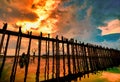 Silhouette U Bein Bridge and people at sunset Ayeyarwady River, Mandalay, Myanmar Royalty Free Stock Photo
