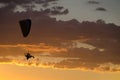 Silhouette of an ultralight flying Royalty Free Stock Photo