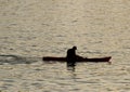 Silhouette of undefined kayaer on water at beautiful sunset time. Santa Cruz Royalty Free Stock Photo