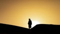 Silhouette of unidentified Berber man in Sahara Desert, Morocco