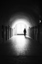 Silhouette of unrecognizable woman in medieval room