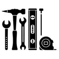 Silhouette of various tools includes a wrench, hammer, spanner, level, and tape measure. Royalty Free Stock Photo