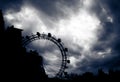 Silhouette of the Vienna Giant Ferris wheel under a bright cloudy sky Royalty Free Stock Photo