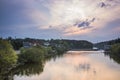 Silhouette view on the water dam at sunset Royalty Free Stock Photo