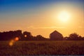 Silhouette of village against evening sky