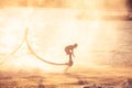 Silhouette and vintage color styl showing flyboard on Chaophya r Royalty Free Stock Photo