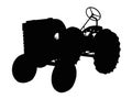 Silhouette of a Vintage Small Tractor Royalty Free Stock Photo