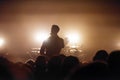Silhouette of a vocalist and drummer on the stage of a musical rock festival Royalty Free Stock Photo