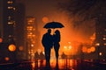 Silhouette of walking couple under umbrella in the night. Love in the rain, romantic scene Royalty Free Stock Photo