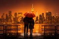 Silhouette of walking couple under umbrella in the night. Love in the rain, romantic scene