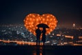 Silhouette of walking couple under umbrella in the night. Love in the rain, romantic scene Royalty Free Stock Photo