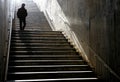 Silhouette walking down the stairs Royalty Free Stock Photo