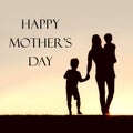 Silhouette of Walking Mother and Young Children Holding Hands at Royalty Free Stock Photo