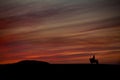 Silhouette of warrior on horse, mongol horseman alone