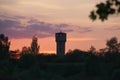 Silhouette of water tower against sunset sky Royalty Free Stock Photo