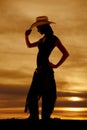 Silhouette western woman profile tip hat