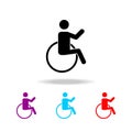 silhouette on a wheelchair icon. Elements of people in different activities in multi colored icons. Premium quality graphic design Royalty Free Stock Photo