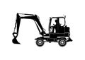 Silhouette of a wheeled excavator .