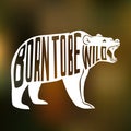 Silhouette of wild bear with text inside on blur