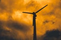Silhouette wind turbine with dusk sky for power shortage crisis