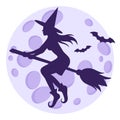 Silhouette of a witch flying on a broomstick and bats on the background of a full moon Royalty Free Stock Photo