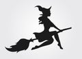 Silhouette of a witch flying on a broomstick