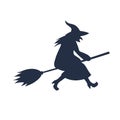 Silhouette of a witch flying on a broomstick