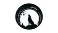 Silhouette of a wolf howling at the moon within a circular fram Royalty Free Stock Photo